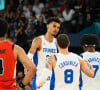 Hier soir, mardi 6 août, c'est accompagné de Lola Duménil que le nageur a assisté au match de basket qui a opposé la France au Canada. 
Quarts de finale - Victor Wembanyama célèbre sa victoire avec Isaia Cordinier et Guerschon Yabusele lors du match de basket face au Canada (82-73) pendant les Jeux Olympiques de Paris 2024, le 6 août. © Federico Pestellini / DPPI / Panoramic / Bestimage