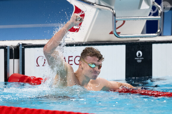 Léon Marchand célèbre sa victoire dans la finale du 200m brasse lors de la cinquième journée des Jeux Olympiques d'été de Paris 2024, le 31 juillet 2024. David Nivière/ABACAPRESS.COM