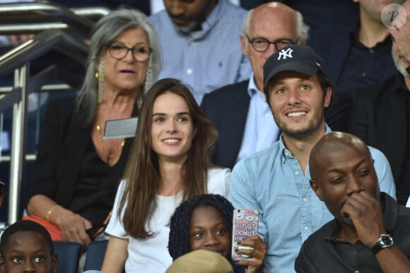 Vianney Bureau (Vianney), sa compagne Catherine Robert dans les tribunes lors du match de championnat de Ligue 1 Conforama opposant le Paris Saint-Germain au Toulouse FC au parc des Princes à Paris, France, le 25 août 2019