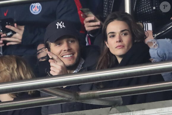 Vianney Bureau et sa compagne Catherine Robert dans les tribunes du parc des Princes à Paris, le 6 mars 2019