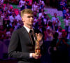 "C'est comme une cérémonie des Césars, des Oscars ou des Molières, c'est trop long mais oui, c'est le principe"
Léon Marchand pendant la cérémonie de clôture des Jeux Olympiques de Paris (JO) 2024 au Stade de France, à Saint-Denis banlieue de Paris, France, le 11 août 2024.