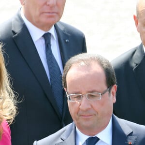 François Hollande et Valérie Trierweiler - Defile du 14 juillet 2013 a Paris.  Traditional military parade as part of the Bastille Day celebrations in Paris, France, 14 July 2013.