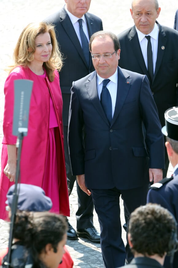 François Hollande et Valérie Trierweiler - Defile du 14 juillet 2013 a Paris.  Traditional military parade as part of the Bastille Day celebrations in Paris, France, 14 July 2013.