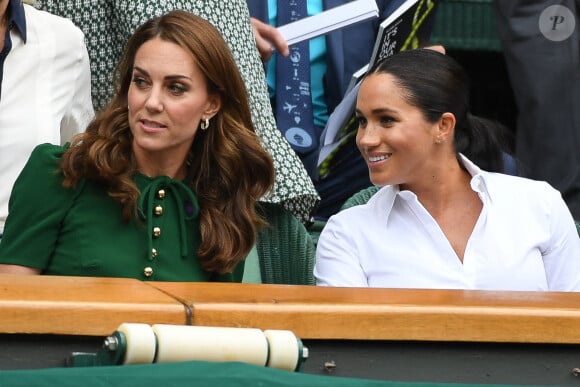 Archives - Catherine (Kate) Middleton, duchesse de Cambridge, Meghan Markle, duchesse de Sussex, sont dans les tribunes lors de la finale femme de Wimbledon "Serena Williams - Simona Halep (2/6 - 2/6) à Londres le 13 juillet 2019. © Chryslène Caillaud / Panoramic / Bestimage