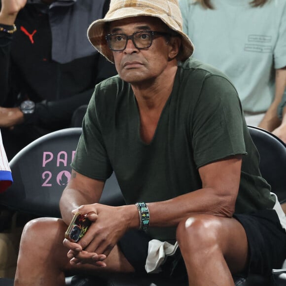 Puis, l'ancien champion de tennis a célébré leur famille multiculturelle en postant les drapeaux du Brésil, de la Suède, de la France, du Cameroun et des États-Unis.
Yannick Noah pendant l'épreuve de basketball de Demi-Finale opposant la France à l'Allemagne lors des Jeux Olympiques de Paris 2024 à Paris, le 8 août 2024