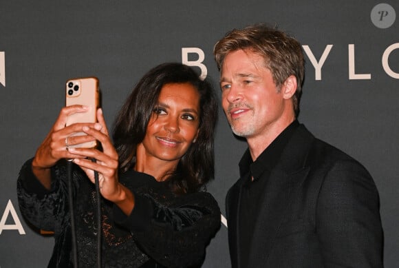 Brad Pitt et Karine Le Marchand à la première du film "Babylon" au cinéma Le Grand Rex à Paris, France, le 14 janvier 2023. © Coadic Guirec/Bestimage 