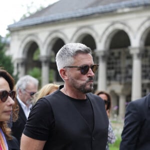 Olivier Minne arrive aux funérailles de Patrice Laffont au cimetière du Père Lachaise le 23 août 2024 à Paris, France. Photo par Nasser Berzane/ABACAPRESS.COM