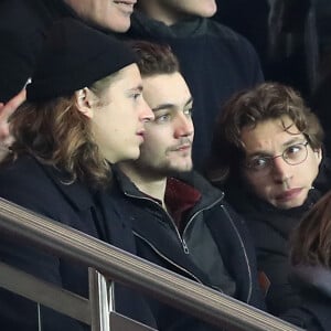 Pierre Sarkozy, Louis Sarkozy et Jean Sarkozy dans les tribunes lors du match de Ligue 1 Paris Saint-Germain - Toulouse FC au parc des Princes à Paris, France, le 19 février 2017. Le PSG fait match nul 0-0 contre le TFC. © Cyril Moreau/Bestimage 