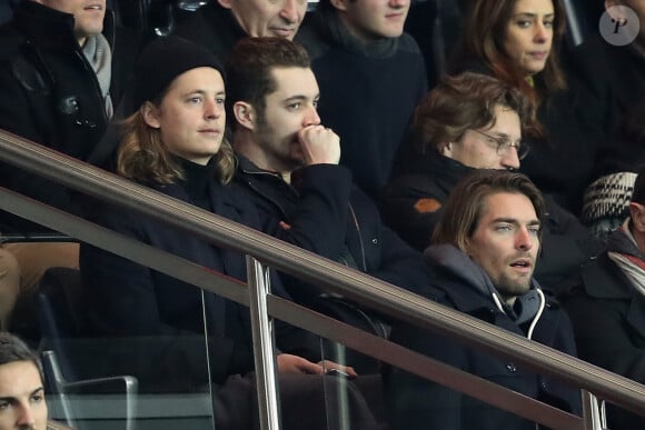 Pierre Sarkozy, Louis Sarkozy, Jean Sarkozy et Camille Lacourt dans les tribunes lors du match de Ligue 1 Paris Saint-Germain - Toulouse FC au parc des Princes à Paris, France, le 19 février 2017. Le PSG fait match nul 0-0 contre le TFC. © Cyril Moreau/Bestimage 