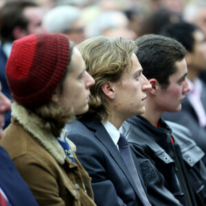 Pierre, Jean et Louis Sarkozy au meeting de Nicolas Sarkozy à Boulogne-Billancourt le 25 novembre 2014. 