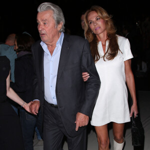 Alain Delon et Rosalie Van Breemen au defilé de mode Elie Saab - Collection pret-a-porter printemps-ete 2013 - paris le 03/10/2012 