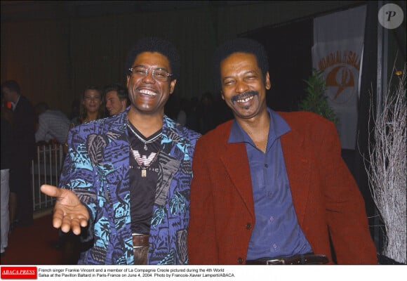 Le chanteur français Francky Vincent et un membre de La Compagnie Créole photographiés lors du 4ème Mondial de la Salsa au Pavillon Baltard à Paris-France le 4 juin 2004. Photo par Francois-Xavier Lamperti/ABACA.