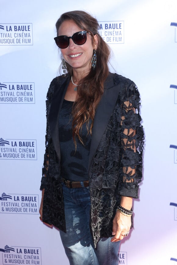 À ses problèmes professionnels, il faut ajouter sa rupture amoureuse...
Audrey Dana assiste au 10e Festival du cinéma et de la musique de film à La Baule, en France, le 30 juin 2024. Photo par Jerome Domine/ABACAPRESS.COM