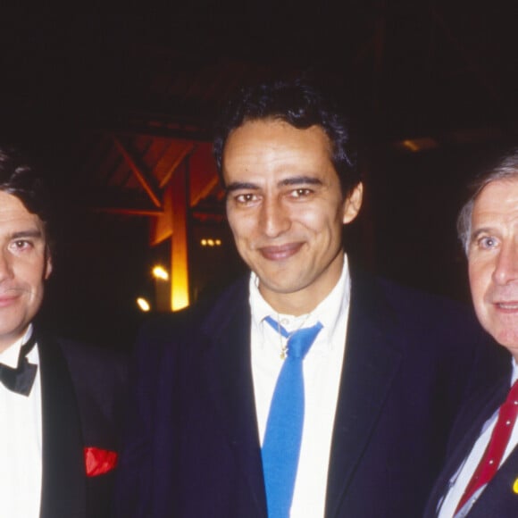 C'est en toute discrétion qu'il luttait contre la maladie.
Archives - Bernard Tapie, Didier Roustan et Michel Hidalgo - Soirée de privatisation de la chaîne TF1 à Paris. Le 15 avril 1987