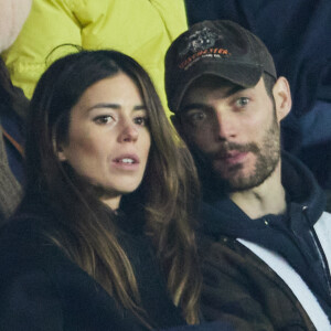 Louis Sarkozy et Natali Husic réunis pour un bel évènement
 
Exclusif - Louis Sarkozy et sa femme Natali Husic - People en tribunes du match de Ligue 1 Uber Eats "PSG contre Reims" (1-1) au Parc des Princes à Paris.