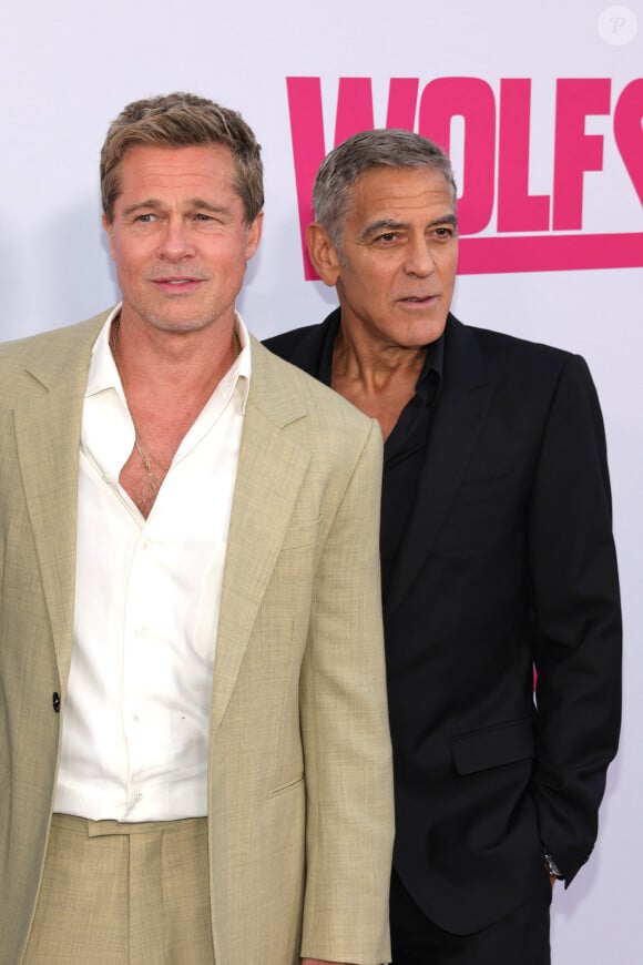 Brad Pitt et George Clooney à Los Angeles lors de la projection en avant-première du film Wolfs mercredi 18 septembre 2024.