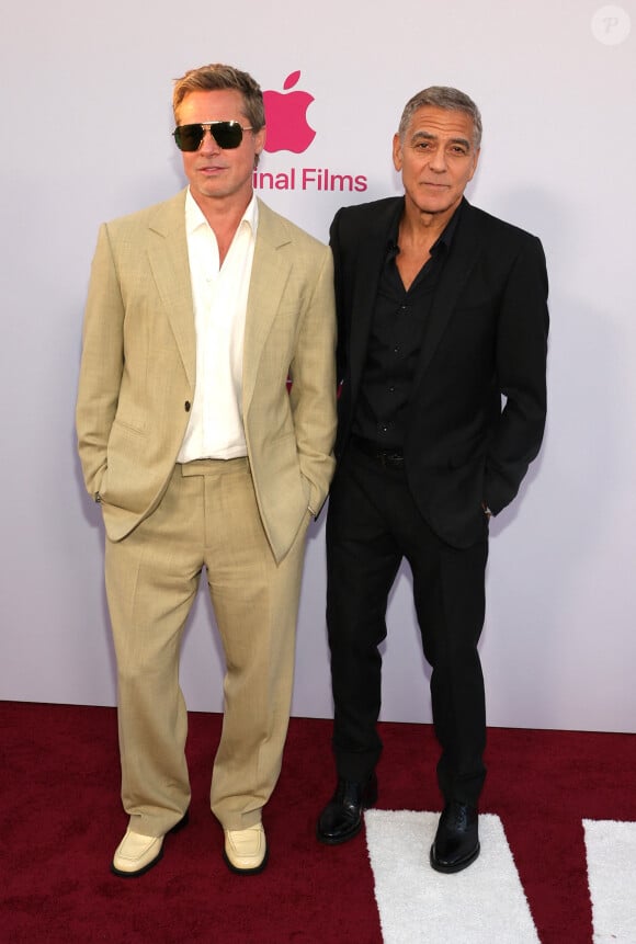 Brad Pitt et George Clooney à Los Angeles lors de la projection en avant-première du film Wolfs mercredi 18 septembre 2024.