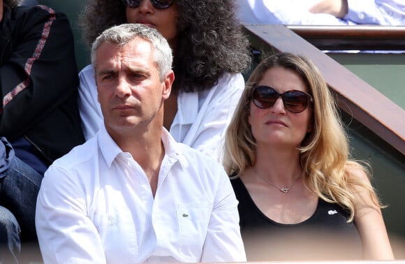 Yann Delaigue et sa compagne Astrid Bard - People dans les tribunes des Internationaux de France de tennis de Roland Garros le 3 juin 2015.