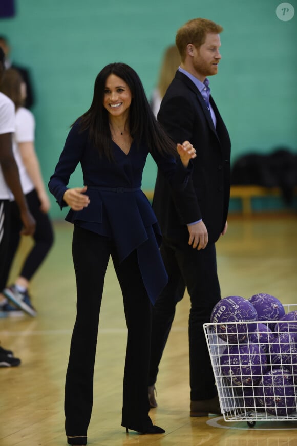 Le prince Harry, duc de Sussex et Meghan Markle, duchesse de Sussex assistent aux Coach Core Awards à l'université de Loughborough le 24 septembre 2018. 