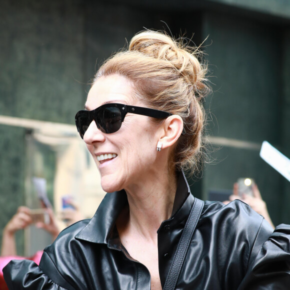 Céline Dion quitte accompagnée de P Munoz l'hôtel Regent à Berlin, au lendemain de son concert à Berlin.