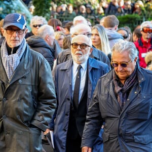 Thierry Lhermitte, Gérard Jugnot, Christian Clavier - Sortie des Obsèques de Michel Blanc en l'église Saint-Eustache à Paris, le 10 octobre 2024. © Moreau / Jacovides / Bestimage 