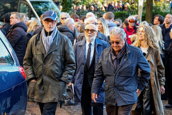 Thierry Lhermitte, Gérard Jugnot, Christian Clavier - Sortie des Obsèques de Michel Blanc en l'église Saint-Eustache à Paris, le 10 octobre 2024. © Moreau / Jacovides / Bestimage 