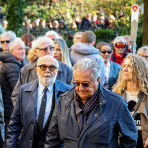 Thierry Lhermitte, Gérard Jugnot, Christian Clavier - Sortie des Obsèques de Michel Blanc en l'église Saint-Eustache à Paris, le 10 octobre 2024. © Moreau / Jacovides / Bestimage 