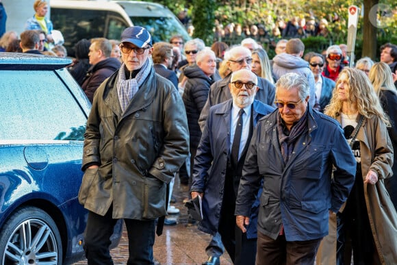 Thierry Lhermitte, Gérard Jugnot, Christian Clavier - Sortie des Obsèques de Michel Blanc en l'église Saint-Eustache à Paris, le 10 octobre 2024. © Moreau / Jacovides / Bestimage 