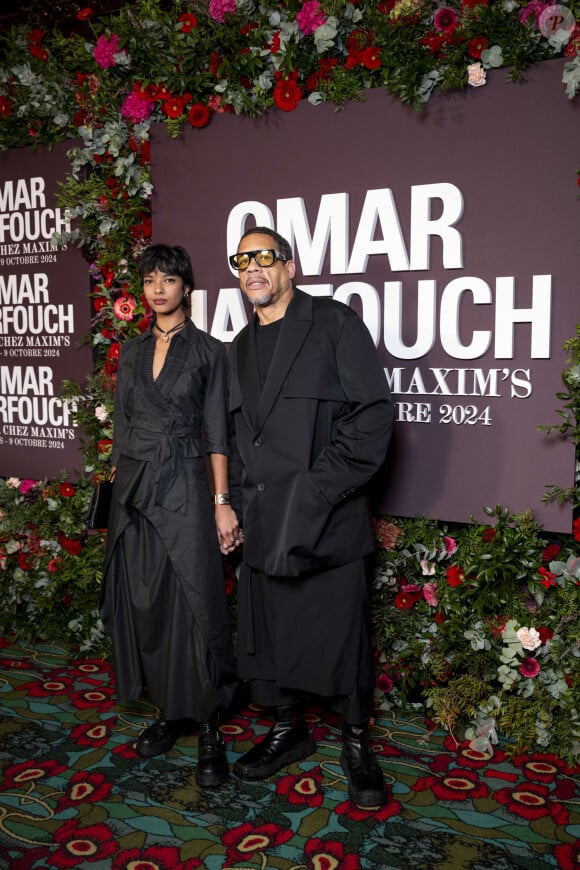 JoeyStarr (Joey Starr) et sa compagne Pauline au photocall de la soirée Omar Harfouch "Dîner chez Maxim's" à Paris le 9 octobre 2024. © Perusseau / Tribeca / Bestimage