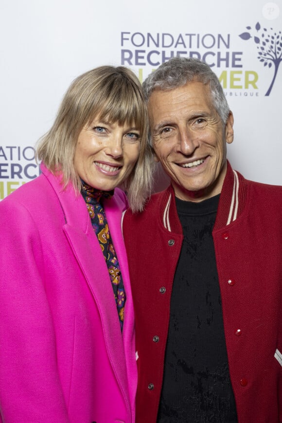 Nagui et sa femme Mélanie Page au photocall du concert du gala des 20 ans de la fondation Recherche Alzheimer "2 générations chantent pour la 3ème" à l'Olympia à Paris le 18 mars 2024. © Cyril Moreau / Bestimage