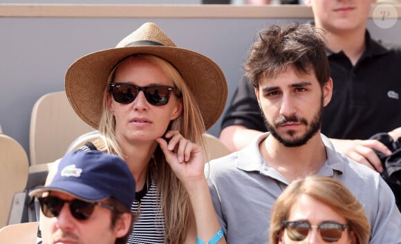 Ben Attal et sa compagne Jordane Crantelle dans les tribunes lors des Internationaux de France de Tennis de Roland Garros 2023. Paris, le 7 juin 2023. © Jacovides-Moreau / Bestimage 