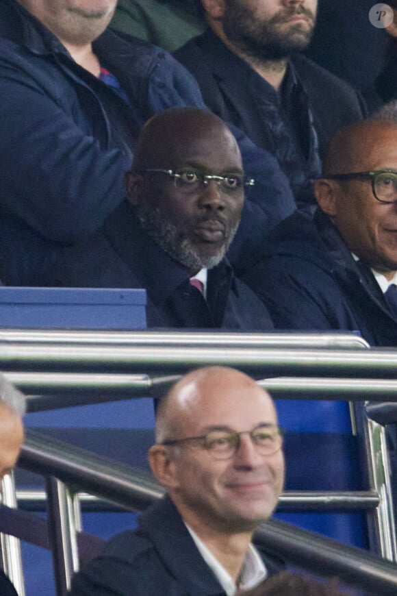 George Weah Ancien président de la République du Liberia dans les tribunes lors du match de Ligue Des Champions (LDC) "PSG - PSV Eindhoven (1-1)" au Parc des Princes à Paris, le 22 octobre 2024.