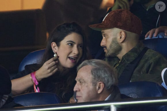 Malik Bentalha dans les tribunes lors du match de Ligue Des Champions (LDC) "PSG - PSV Eindhoven (1-1)" au Parc des Princes à Paris, le 22 octobre 2024.