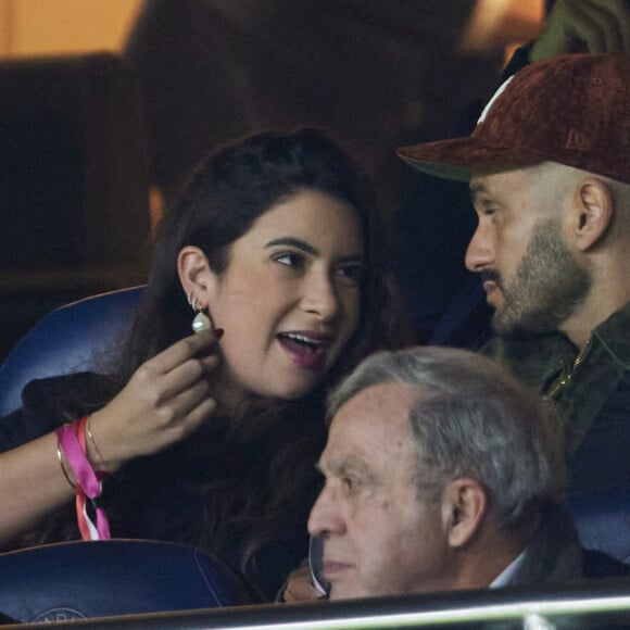 Malik Bentalha dans les tribunes lors du match de Ligue Des Champions (LDC) "PSG - PSV Eindhoven (1-1)" au Parc des Princes à Paris, le 22 octobre 2024.