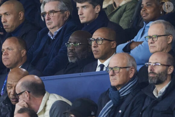 George Weah, ancien président de la République du Liberia dans les tribunes lors du match de Ligue Des Champions (LDC) "PSG - PSV Eindhoven (1-1)" au Parc des Princes à Paris, le 22 octobre 2024.