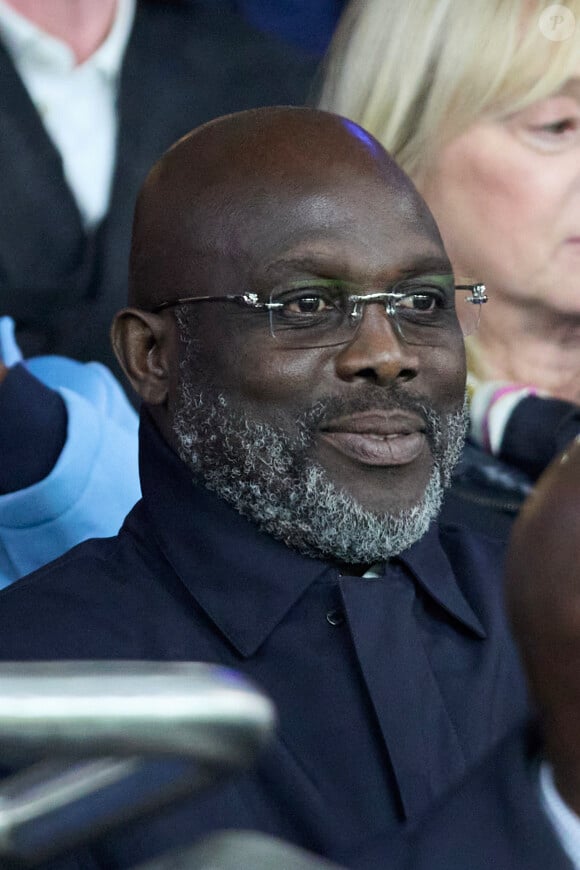 George Weah Ancien président de la République du Liberia dans les tribunes lors du match de Ligue Des Champions (LDC) "PSG - PSV Eindhoven (1-1)" au Parc des Princes à Paris, le 22 octobre 2024.