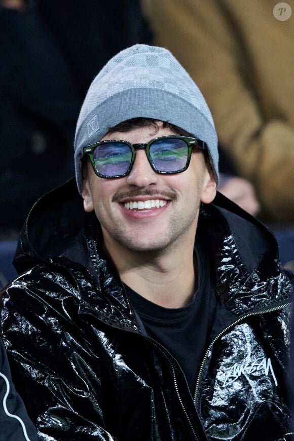 Just Riadh dans les tribunes lors du match de Ligue Des Champions (LDC) "PSG - PSV Eindhoven (1-1)" au Parc des Princes à Paris, le 22 octobre 2024.