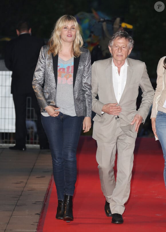 Sa présence au tribunal aurait été très hypothétique, 
Roman Polanski et Emmanuelle Seigner arrivent à la première du film "Blue Jasmine" à Paris le 27 août 2013. © Denis Guignebourg / Bestimage