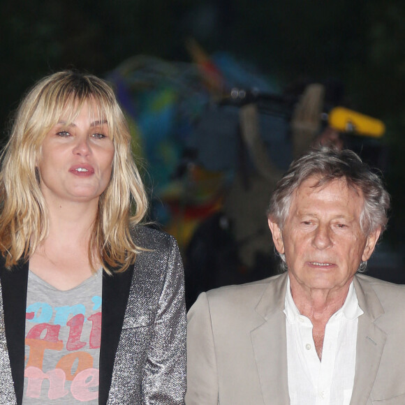 Sa présence au tribunal aurait été très hypothétique, 
Roman Polanski et Emmanuelle Seigner arrivent à la première du film "Blue Jasmine" à Paris le 27 août 2013. © Denis Guignebourg / Bestimage