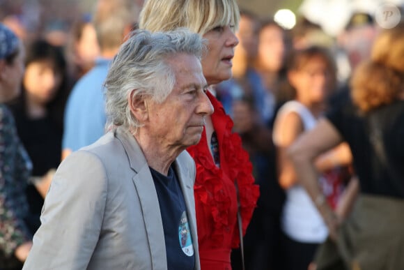 Roman Polanski et sa femme Emmanuelle Seigner - Les Rolling Stones en concert à l'hippodrome de Longchamp, dans le cadre de leur tournée anniversaire "Sixty", qui marque leurs 60 ans de carrière (1962-2022). Paris, le 23 juillet 2022. © Stéphane Vansteenkiste/Bestimage