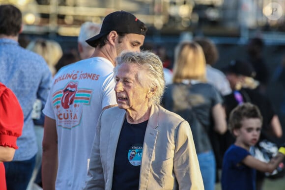 Roman Polanski et sa femme Emmanuelle Seigner - Les Rolling Stones en concert à l'hippodrome de Longchamp, dans le cadre de leur tournée anniversaire "Sixty", qui marque leurs 60 ans de carrière (1962-2022). Paris, le 23 juillet 2022. © Stéphane Vansteenkiste/Bestimage