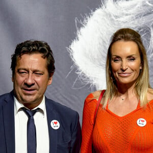 Laurent Gerra et sa femme Christelle Bardet - Photocall de la cérémonie de remise du Prix Lumière à W.Wenders à l'occasion de la 15ème Edition du Festival Lumière de Lyon. Le 20 octobre 2023 © Sandrine Thesillat / Panoramic / Bestimage 