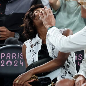 Yannick Noah et sa compagne Malika - Les célébrités en tribunes pendant l'épreuve de basketball de Demi-Finale opposant la France à l'Allemagne lors des Jeux Olympiques de Paris 2024 (JO) à l'Arena Bercy, à Paris, France, le 8 août 2024. © Jacovides-Perusseau/Bestimage