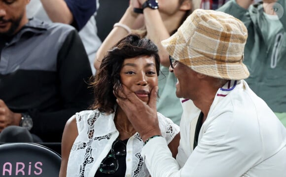 Yannick Noah et sa compagne Malika - Les célébrités en tribunes pendant l'épreuve de basketball de Demi-Finale opposant la France à l'Allemagne lors des Jeux Olympiques de Paris 2024 (JO) à l'Arena Bercy, à Paris, France, le 8 août 2024. © Jacovides-Perusseau/Bestimage