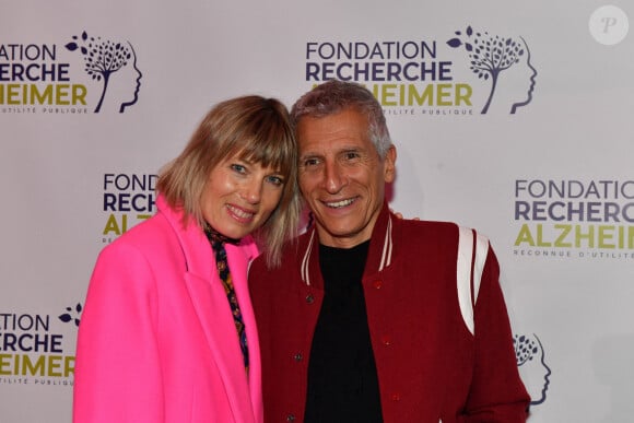 Après une scolarité brillante et son bac décroché mention très bien...
Mélanie Page, Nagui lors du Gala des 20 ans de la Fondation Recherche Alzheimer qui s'est tenu à l'Olympia à Paris, France le 18 mars 2024. Photo par Christophe Meng / ABACAPRESS.COM