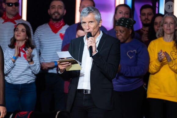 L'animateur a eu une première fille, Nina, avec Marine Vignes Nagui, Animateur radio et télévision lors du Téléthon 2023, à Saint Denis, près de Paris, France le 9 décembre 2023. Le Téléthon est un marathon télévisuel de trente heures diffusé sur les chaînes de France Télévisions. En France, le Téléthon est une manifestation caritative organisée depuis 1987 par l'Association française contre les myopathies (AFM) pour financer la recherche sur les maladies génétiques neuromusculaires, ainsi que sur d'autres maladies génétiques rares. Photo par Alexis Jumeau/ABACAPRESS.COM