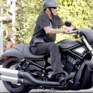 Exclusif - Johnny Hallyday sur sa moto Harley Davidson (archive)