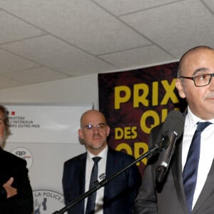 Exclusif - Laurent Nunez, préfet de Police, Olivier Marchal et Fabrice Gardon, nouveau directeur PJ lors de la remise du prix du Quai des Orfèvres au 36 à Paris, siège de la police judiciaire le 5 novembre 2024. © Didier Sabardin / Bestimage 