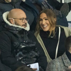 Vitaa (enceinte de son 3ème enfant) et son mari Hicham Bendaoud, Nikola Karabatic - lors de la huitième de finale aller de la Ligue des champions entre le PSG et le Real Madrid au Parc des Princes à Paris le 15 février 2022. © Cyril Moreau/Bestimage