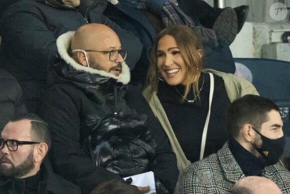 Vitaa (enceinte de son 3ème enfant) et son mari Hicham Bendaoud, Nikola Karabatic - lors de la huitième de finale aller de la Ligue des champions entre le PSG et le Real Madrid au Parc des Princes à Paris le 15 février 2022. © Cyril Moreau/Bestimage